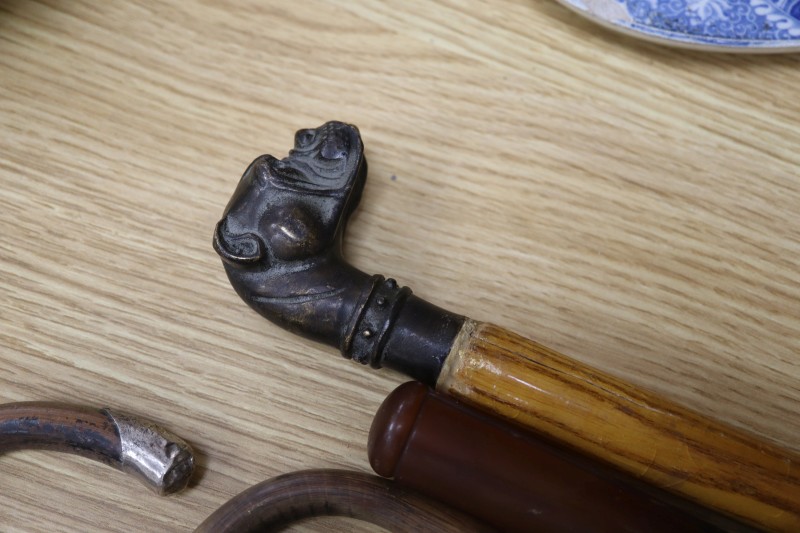 A late 19th / early 20th century stiletto sword cane, with faux tortoiseshell handle, locking collar and 35cm faceted toledo blade,